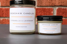 Load image into Gallery viewer, Two soy candles with their respective labels showing. One larger jar labeled 'Citronella &amp; Lavender' and a smaller jar with 'Titronella Lavender' written on it, both with 'Crenshaw Candles' branding.
